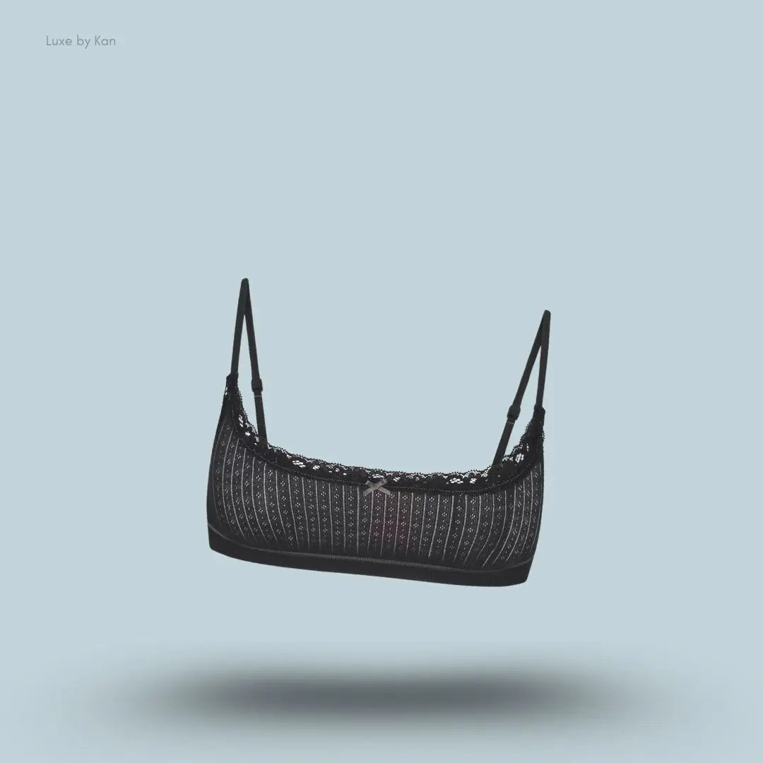 SKIMS Lightweight Cotton Pointelle Scoop Bralette in Soot Tonal, flat lay on light blue background
