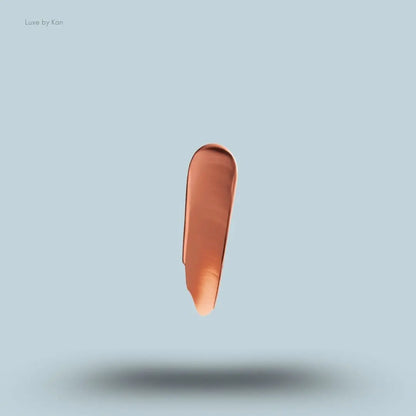 Kylie Cosmetics Plumping Powder Matte Lip 3ml swatch on blue background — Luxe by Kan India