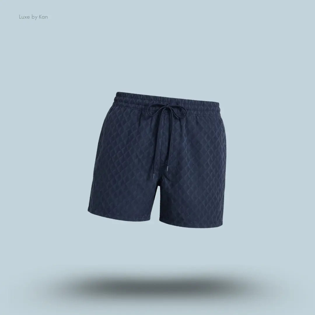 Lululemon Swim Short 5" Lined in Square Diamond Screen Navy Multi, flat lay on light blue background