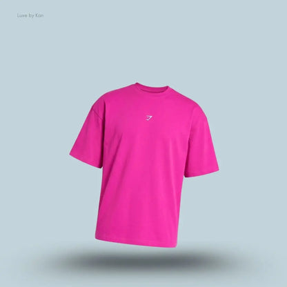 Gymshark Atlas T-Shirt oversized men's pink cotton graphic t-shirt on a blue background