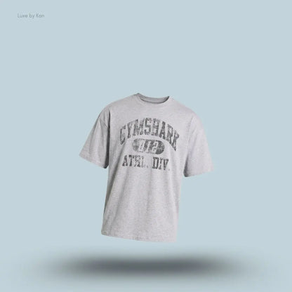 Gymshark Athletic Division Graphic T-Shirt in light grey with front graphic print on a blue background