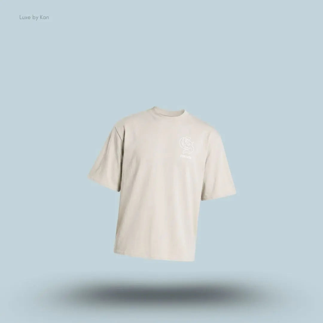 Gymshark Performance T-Shirt in tinted white shade displayed on a blue background with an oversized boxy-fit short-sleeve design