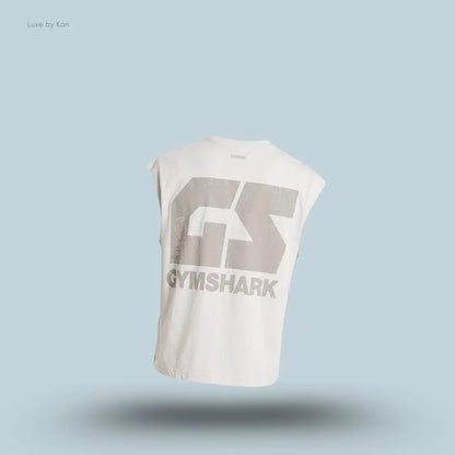 Gymshark Accent Capped Sleeve T-Shirt in tinted white shade displayed on a blue background with an oversized men's T-shirt design back view