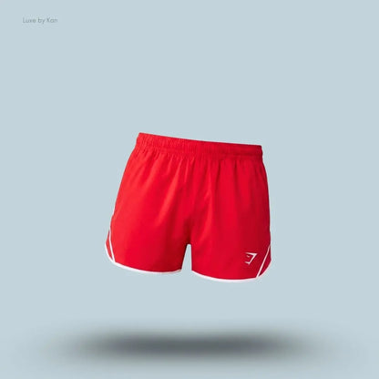 gymshark Accent Conditioning Shorts in red with white trim, lightweight men's training shorts with logo detail