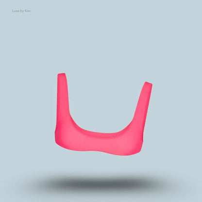 SKIMS Fits Everybody Micro Scoop Bralette in Ultra Pink, flat lay on light blue background