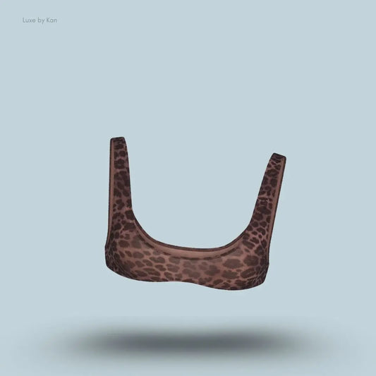 SKIMS Fits Everybody Micro Scoop Bralette in Umber Leopard Print, flat lay on light blue background