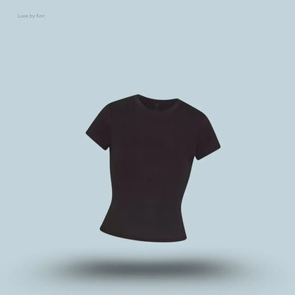 SKIMS Worn In Jersey T-Shirt in Washed Onyx, flat lay on light blue background