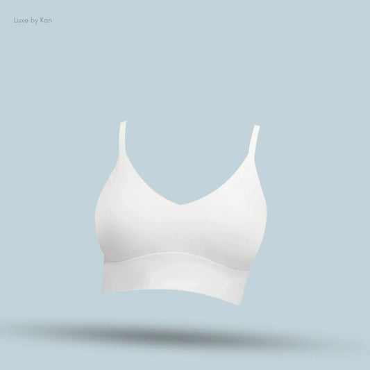 Lululemon Focuser Scoop-Neck Bra in White, front view on light blue background
