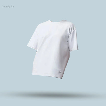 Alo Double Take Short Sleeve in White, flat lay on light blue background