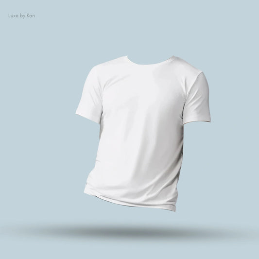 Alo Conquer Reform Crewneck Short Sleeve in White, flat lay on light blue background