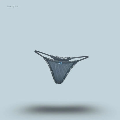SKIMS Lightweight Cotton Pointelle Lace String Thong in Zircon Tonal, flat lay on light blue background